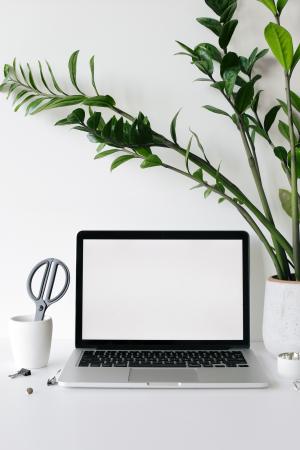 picture of a computer at a desk 