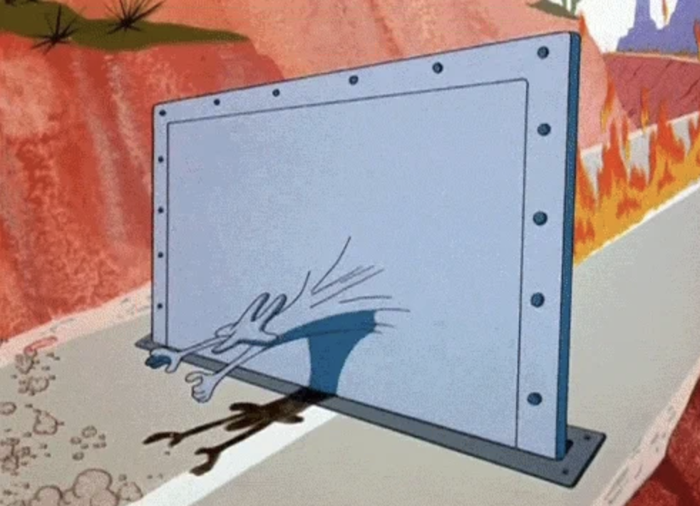 Wiley Coyote running into a metal wall with flames behind him