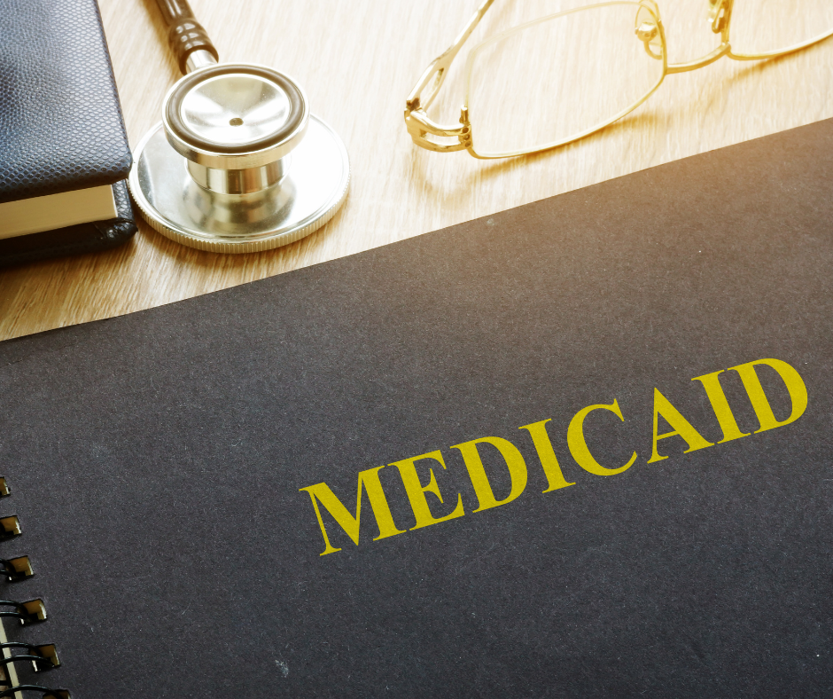 Folder with text that reads "Medicaid"